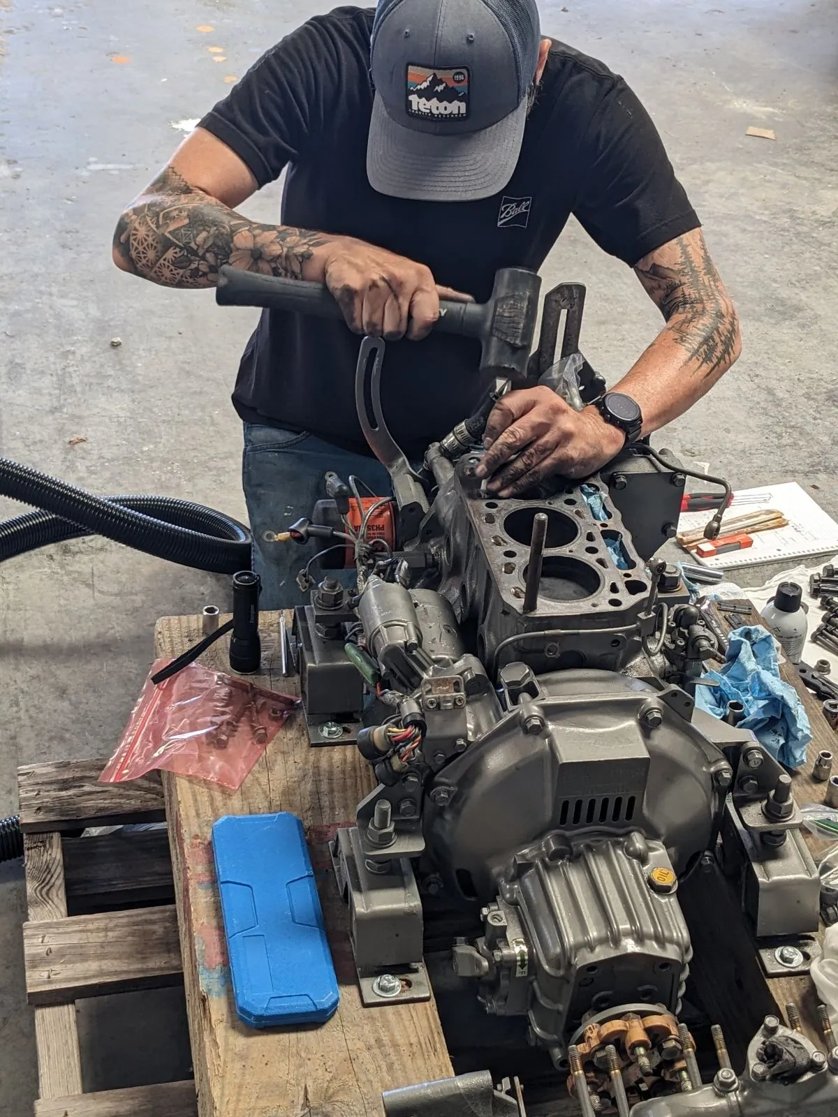Tearing down the old diesel engine.