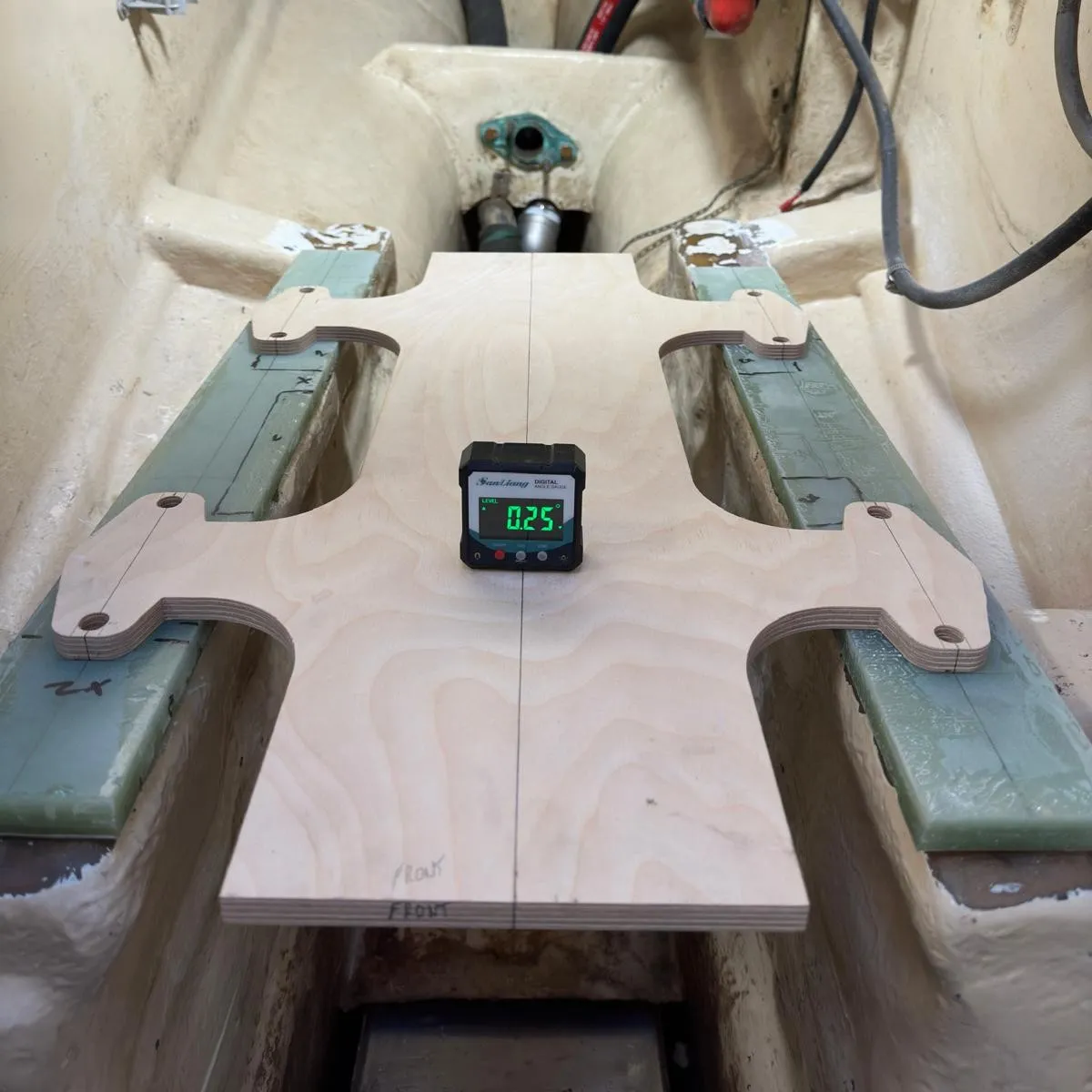 Positioning G10 shimstack before bonding to stringers